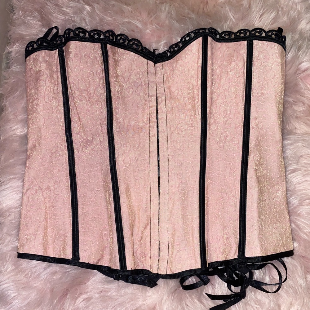 Pink sparkling with a little gold corset.